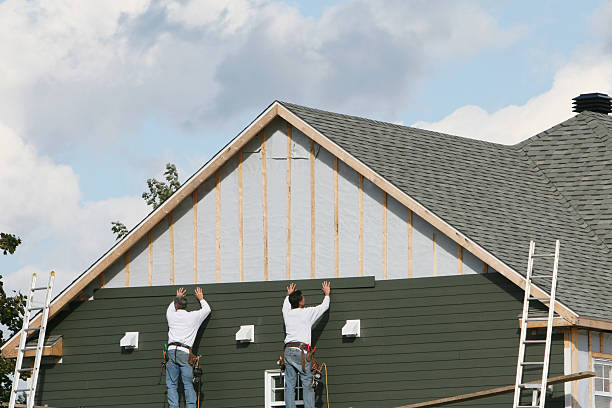 Professional Storm Damage Siding Repair technician working in Line Lexington, PA